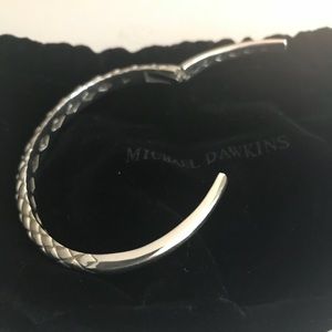 New with pouch. Michael Dawkins hinged sterling cuff, pouch